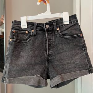 Levi’s “acid wash” black high waisted jean shorts
